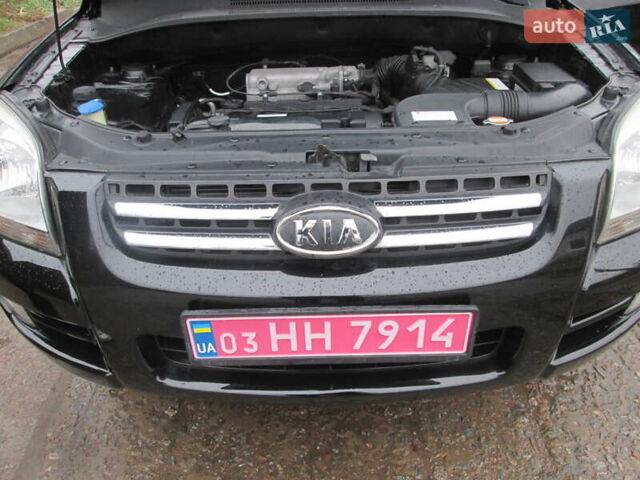 Черный Киа Sportage, объемом двигателя 2 л и пробегом 213 тыс. км за 7700 $, фото 27 на Automoto.ua