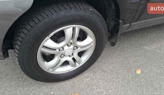 Черный Киа Sportage, объемом двигателя 2 л и пробегом 170 тыс. км за 8700 $, фото 7 на Automoto.ua