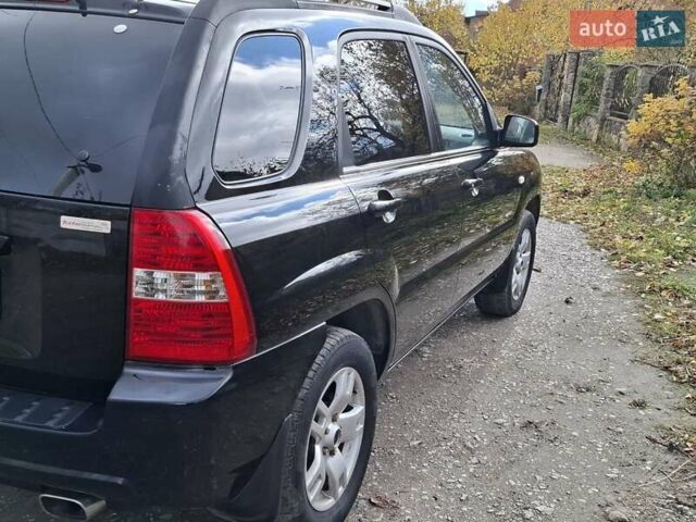 Черный Киа Sportage, объемом двигателя 1.99 л и пробегом 283 тыс. км за 6850 $, фото 3 на Automoto.ua