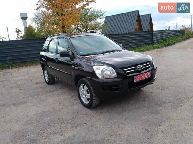 Чорний Кіа Sportage, об'ємом двигуна 2 л та пробігом 150 тис. км за 7000 $, фото 25 на Automoto.ua