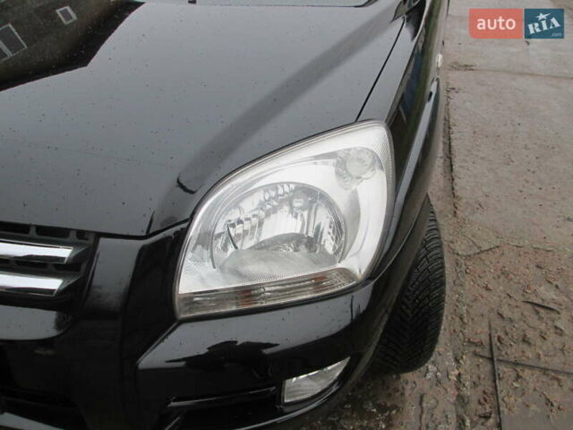 Черный Киа Sportage, объемом двигателя 2 л и пробегом 213 тыс. км за 7700 $, фото 9 на Automoto.ua
