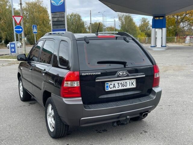 Черный Киа Sportage, объемом двигателя 2 л и пробегом 202 тыс. км за 6500 $, фото 3 на Automoto.ua