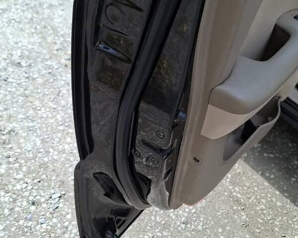 Черный Киа Sportage, объемом двигателя 1.99 л и пробегом 283 тыс. км за 6850 $, фото 29 на Automoto.ua