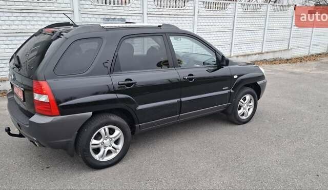 Черный Киа Sportage, объемом двигателя 2 л и пробегом 170 тыс. км за 8700 $, фото 5 на Automoto.ua