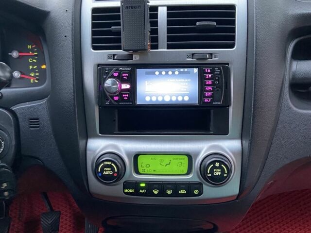 Чорний Кіа Sportage, об'ємом двигуна 2 л та пробігом 227 тис. км за 6900 $, фото 12 на Automoto.ua