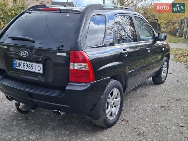 Черный Киа Sportage, объемом двигателя 1.99 л и пробегом 283 тыс. км за 6850 $, фото 9 на Automoto.ua