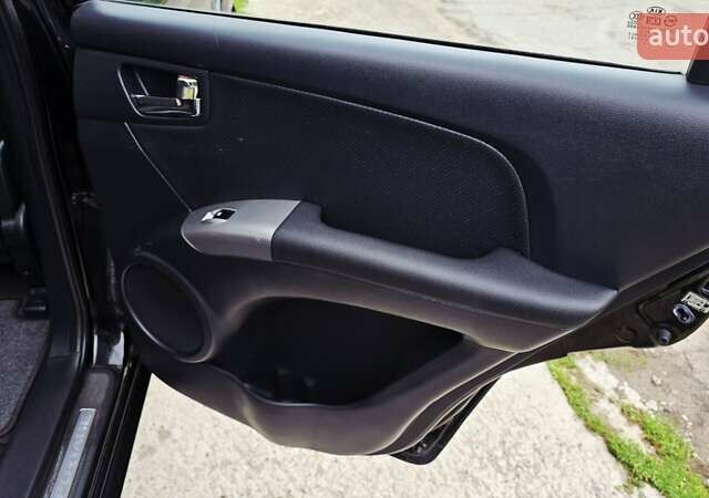 Чорний Кіа Sportage, об'ємом двигуна 2 л та пробігом 172 тис. км за 7999 $, фото 54 на Automoto.ua