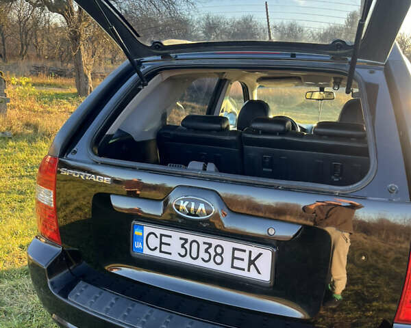 Чорний Кіа Sportage, об'ємом двигуна 1.99 л та пробігом 281 тис. км за 7600 $, фото 4 на Automoto.ua