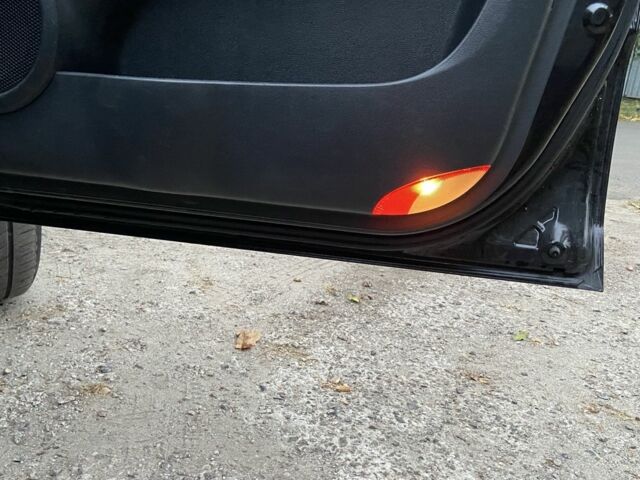 Чорний Кіа Sportage, об'ємом двигуна 2 л та пробігом 227 тис. км за 6900 $, фото 17 на Automoto.ua