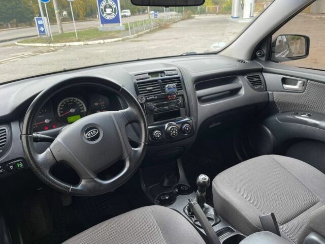 Черный Киа Sportage, объемом двигателя 2 л и пробегом 202 тыс. км за 6500 $, фото 5 на Automoto.ua