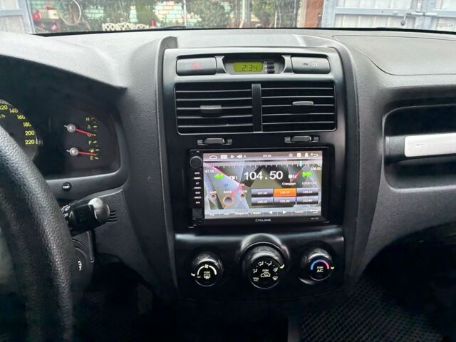 Черный Киа Sportage, объемом двигателя 2 л и пробегом 322 тыс. км за 7000 $, фото 6 на Automoto.ua