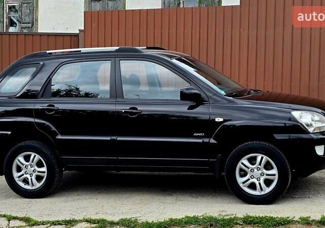 Чорний Кіа Sportage, об'ємом двигуна 2 л та пробігом 172 тис. км за 7999 $, фото 13 на Automoto.ua