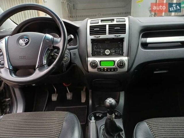 Черный Киа Sportage, объемом двигателя 2 л и пробегом 160 тыс. км за 7777 $, фото 24 на Automoto.ua