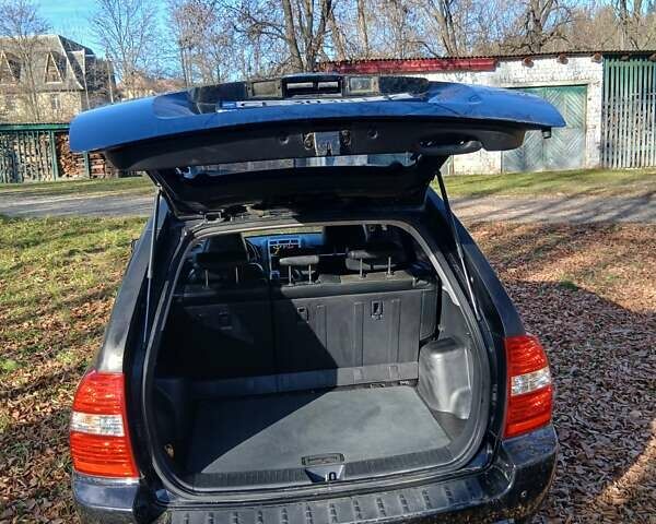 Черный Киа Sportage, объемом двигателя 1.99 л и пробегом 281 тыс. км за 6800 $, фото 15 на Automoto.ua