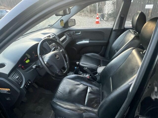 Чорний Кіа Sportage, об'ємом двигуна 2 л та пробігом 200 тис. км за 3950 $, фото 4 на Automoto.ua