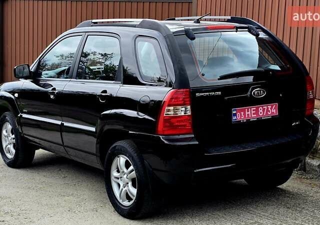 Чорний Кіа Sportage, об'ємом двигуна 2 л та пробігом 172 тис. км за 7999 $, фото 24 на Automoto.ua