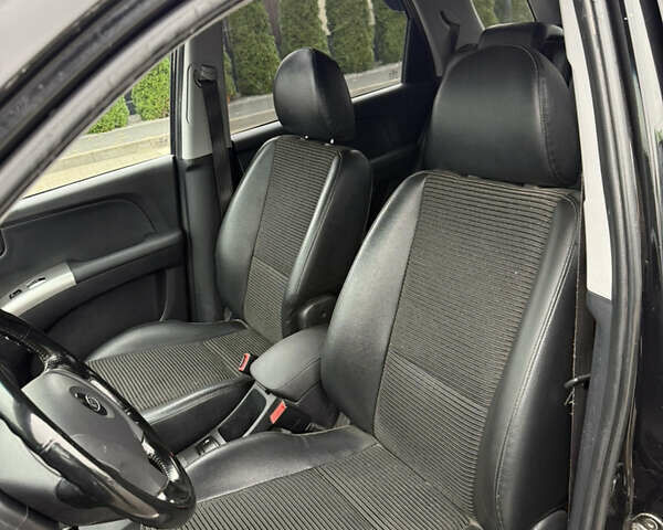 Чорний Кіа Sportage, об'ємом двигуна 1.98 л та пробігом 248 тис. км за 6999 $, фото 20 на Automoto.ua