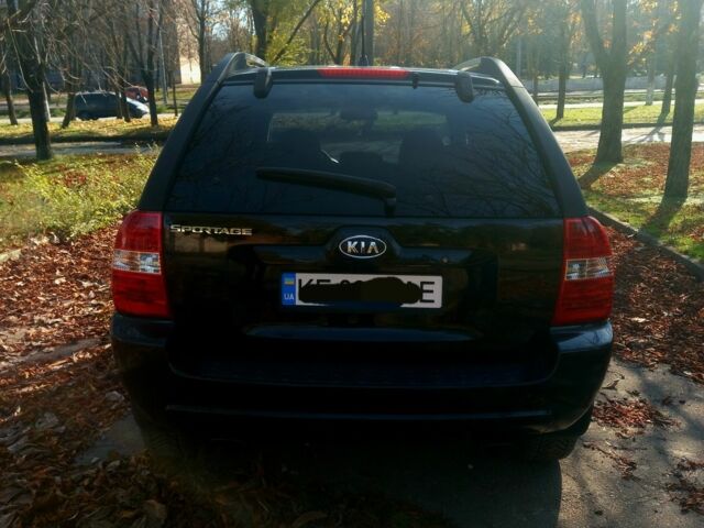 Чорний Кіа Sportage, об'ємом двигуна 2 л та пробігом 263 тис. км за 8100 $, фото 4 на Automoto.ua
