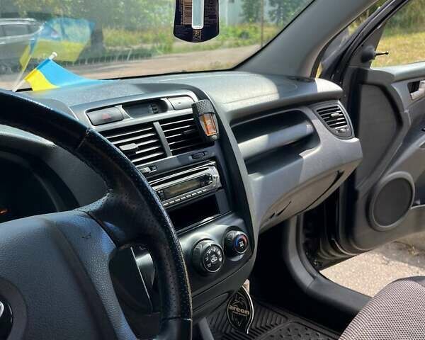 Чорний Кіа Sportage, об'ємом двигуна 1.98 л та пробігом 200 тис. км за 7900 $, фото 11 на Automoto.ua