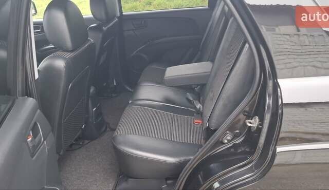 Черный Киа Sportage, объемом двигателя 2 л и пробегом 170 тыс. км за 8700 $, фото 14 на Automoto.ua