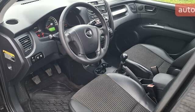 Черный Киа Sportage, объемом двигателя 2 л и пробегом 170 тыс. км за 8700 $, фото 11 на Automoto.ua