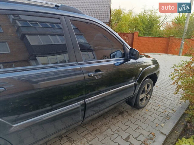 Чорний Кіа Sportage, об'ємом двигуна 1.98 л та пробігом 232 тис. км за 7900 $, фото 8 на Automoto.ua