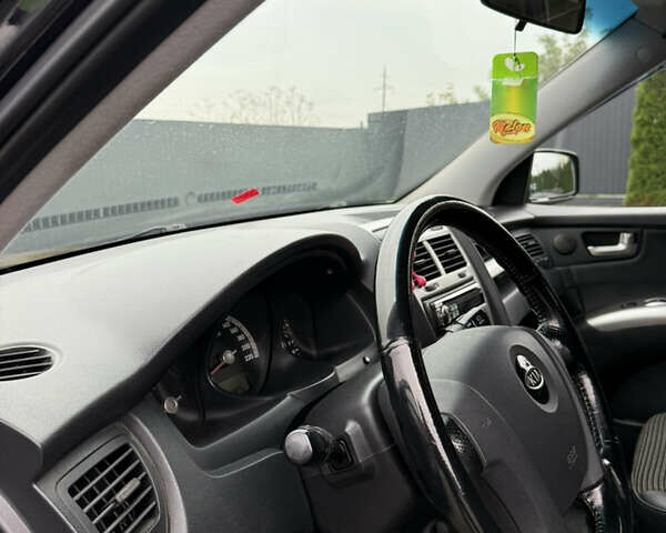 Чорний Кіа Sportage, об'ємом двигуна 1.98 л та пробігом 248 тис. км за 6999 $, фото 18 на Automoto.ua