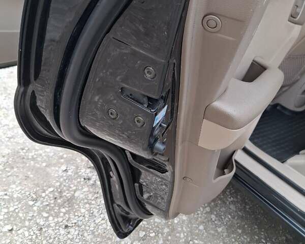 Черный Киа Sportage, объемом двигателя 1.99 л и пробегом 283 тыс. км за 6850 $, фото 28 на Automoto.ua