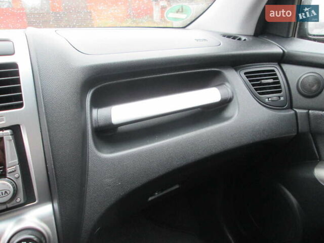 Черный Киа Sportage, объемом двигателя 2 л и пробегом 213 тыс. км за 7700 $, фото 28 на Automoto.ua