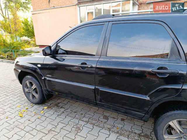 Чорний Кіа Sportage, об'ємом двигуна 1.98 л та пробігом 232 тис. км за 7900 $, фото 4 на Automoto.ua