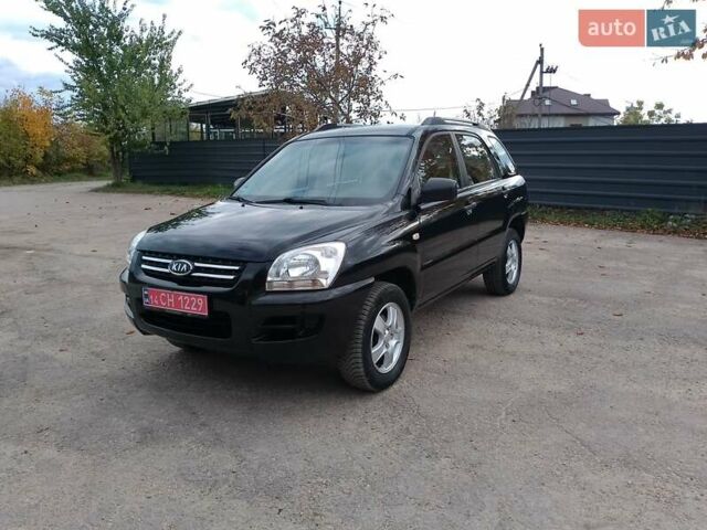 Чорний Кіа Sportage, об'ємом двигуна 2 л та пробігом 150 тис. км за 7000 $, фото 27 на Automoto.ua