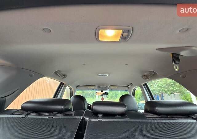 Чорний Кіа Sportage, об'ємом двигуна 2 л та пробігом 172 тис. км за 7999 $, фото 59 на Automoto.ua