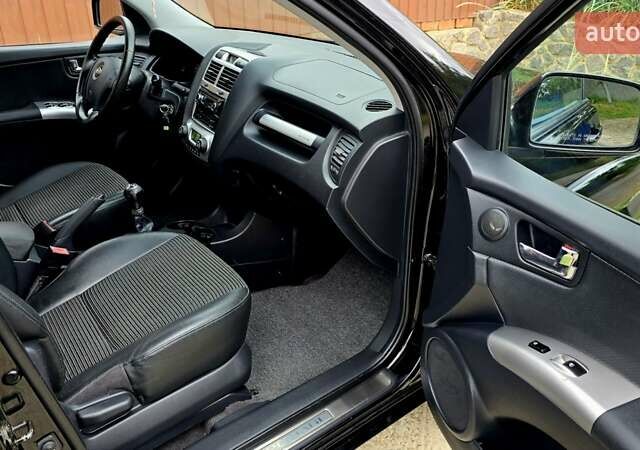 Чорний Кіа Sportage, об'ємом двигуна 2 л та пробігом 172 тис. км за 7999 $, фото 48 на Automoto.ua