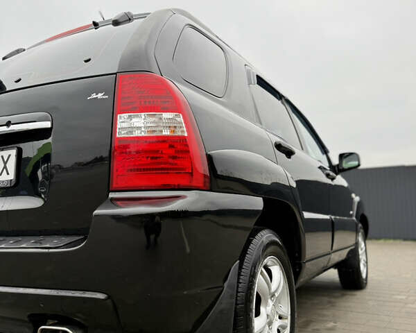 Чорний Кіа Sportage, об'ємом двигуна 1.98 л та пробігом 248 тис. км за 6999 $, фото 8 на Automoto.ua