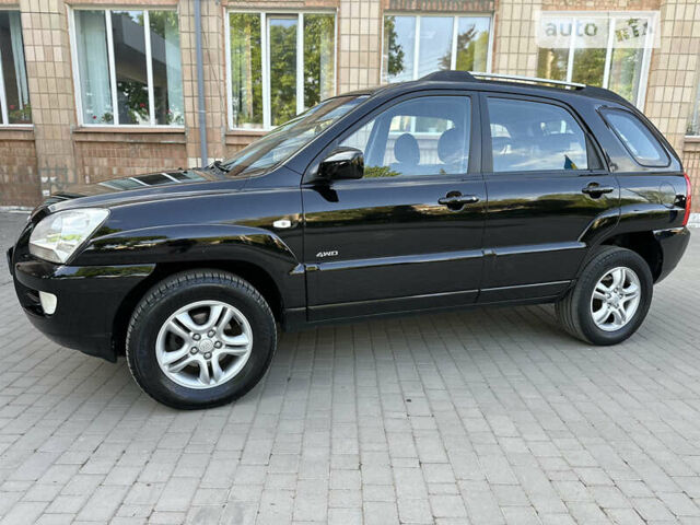 Чорний Кіа Sportage, об'ємом двигуна 2 л та пробігом 131 тис. км за 8400 $, фото 5 на Automoto.ua