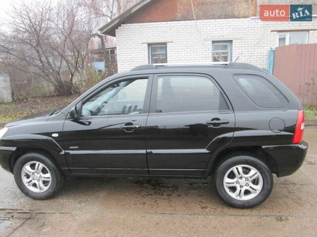 Черный Киа Sportage, объемом двигателя 2 л и пробегом 213 тыс. км за 7700 $, фото 5 на Automoto.ua