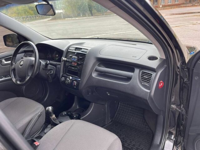 Черный Киа Sportage, объемом двигателя 2 л и пробегом 202 тыс. км за 6500 $, фото 7 на Automoto.ua