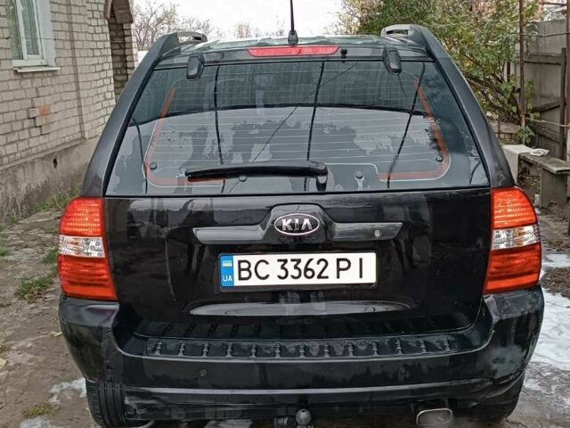 Черный Киа Sportage, объемом двигателя 2 л и пробегом 187 тыс. км за 7500 $, фото 2 на Automoto.ua