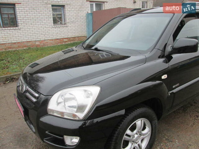 Черный Киа Sportage, объемом двигателя 2 л и пробегом 213 тыс. км за 7700 $, фото 6 на Automoto.ua