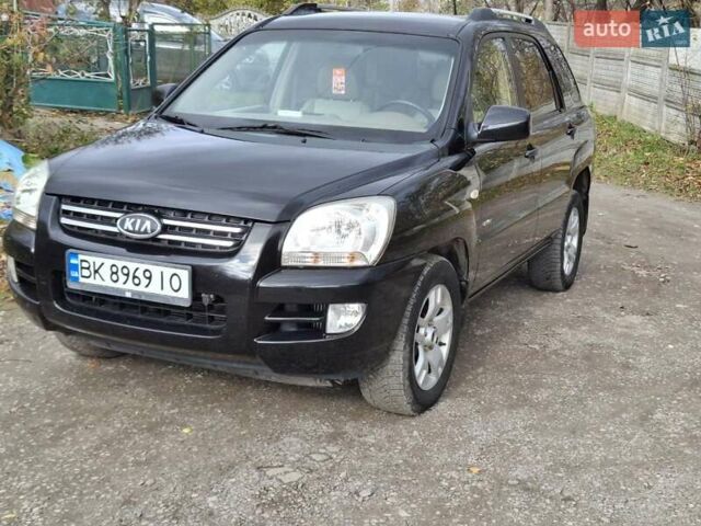 Черный Киа Sportage, объемом двигателя 1.99 л и пробегом 283 тыс. км за 6850 $, фото 13 на Automoto.ua