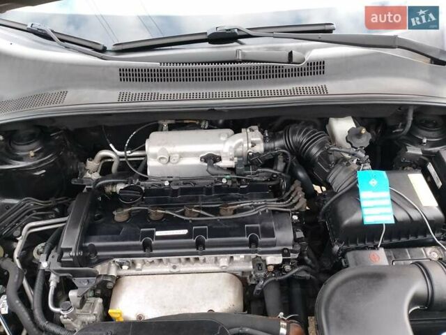 Чорний Кіа Sportage, об'ємом двигуна 2 л та пробігом 150 тис. км за 7000 $, фото 42 на Automoto.ua