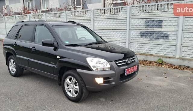 Черный Киа Sportage, объемом двигателя 2 л и пробегом 170 тыс. км за 8700 $, фото 6 на Automoto.ua