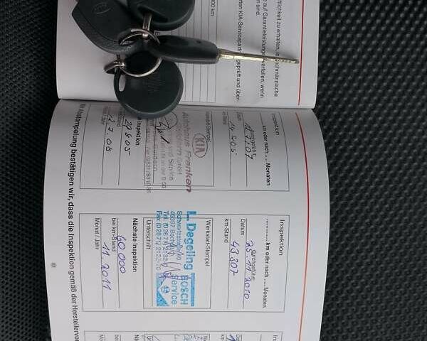 Чорний Кіа Sportage, об'ємом двигуна 2 л та пробігом 150 тис. км за 7000 $, фото 43 на Automoto.ua