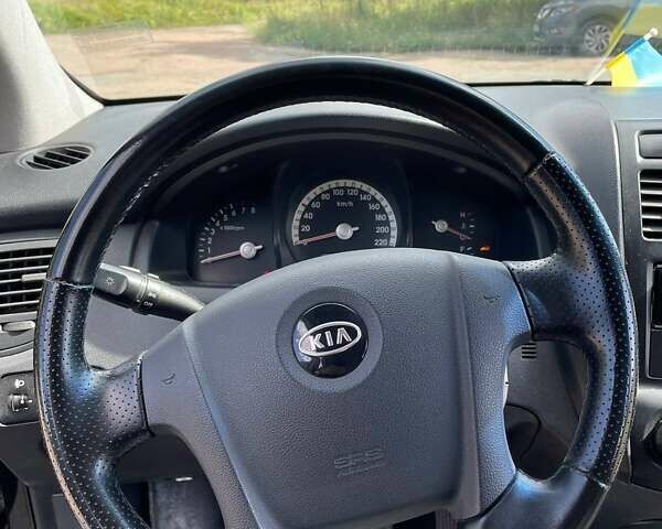 Чорний Кіа Sportage, об'ємом двигуна 1.98 л та пробігом 200 тис. км за 7900 $, фото 13 на Automoto.ua