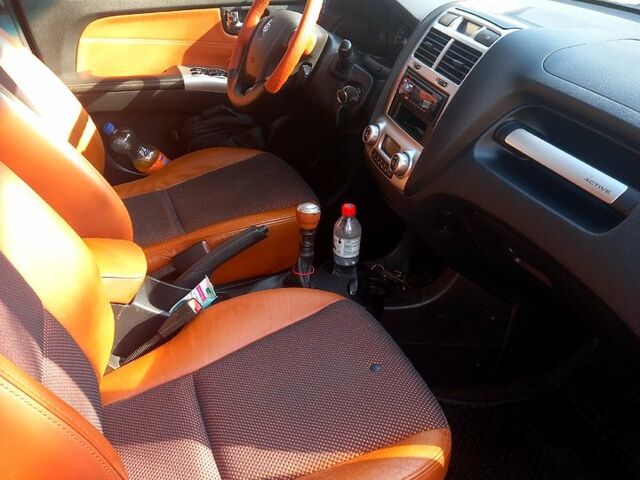 Черный Киа Sportage, объемом двигателя 2 л и пробегом 263 тыс. км за 8100 $, фото 5 на Automoto.ua