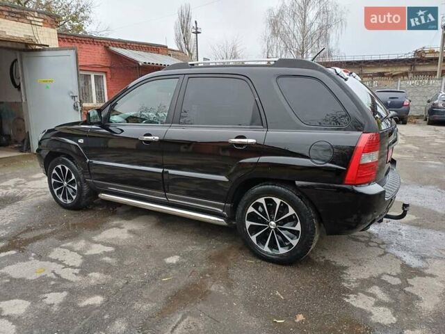 Черный Киа Sportage, объемом двигателя 2 л и пробегом 160 тыс. км за 7777 $, фото 16 на Automoto.ua
