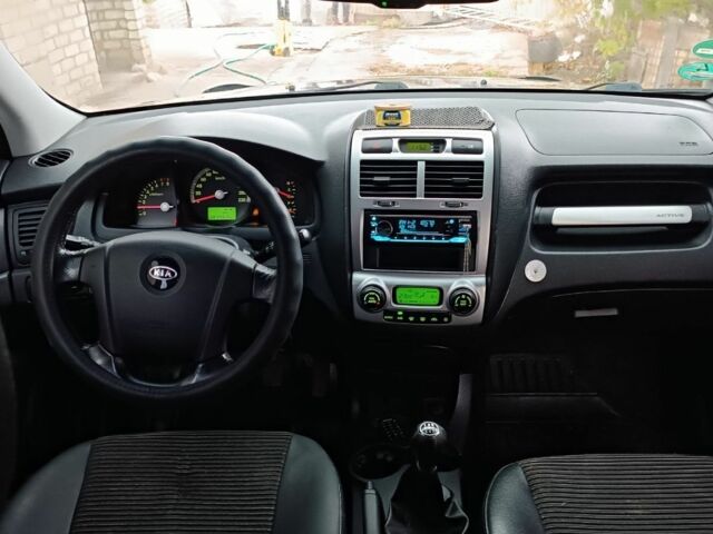 Черный Киа Sportage, объемом двигателя 2 л и пробегом 187 тыс. км за 7500 $, фото 3 на Automoto.ua