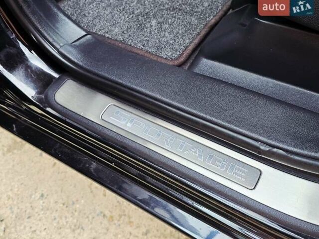 Чорний Кіа Sportage, об'ємом двигуна 2 л та пробігом 172 тис. км за 7999 $, фото 57 на Automoto.ua