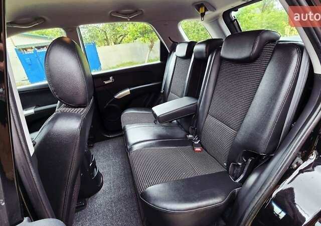 Чорний Кіа Sportage, об'ємом двигуна 2 л та пробігом 172 тис. км за 7999 $, фото 55 на Automoto.ua