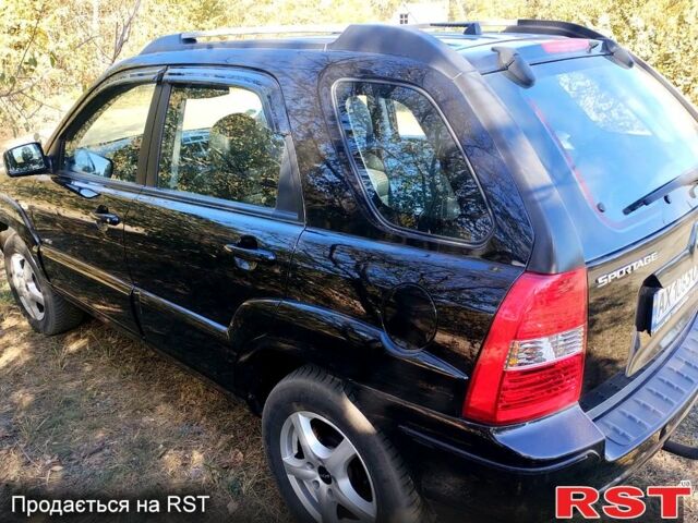 Чорний Кіа Sportage, об'ємом двигуна 2 л та пробігом 197 тис. км за 6900 $, фото 4 на Automoto.ua